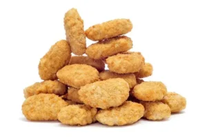 Pile of fried chicken nuggets