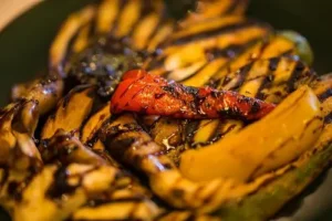 Grill marked peppers after going through a CircFood Flame Grill