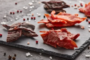 Different types of Jerky on a stone slab