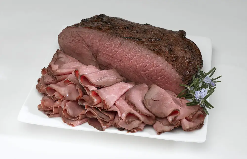Whole and sliced roast beef