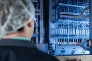 Worker looking at a piece of equipment